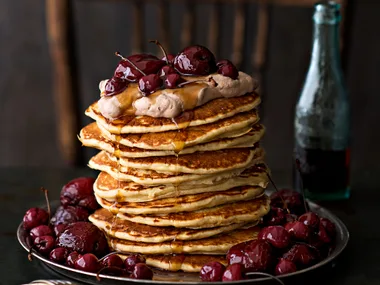 Buckwheat buttermilk pancakes with maple-soaked plums and cherries