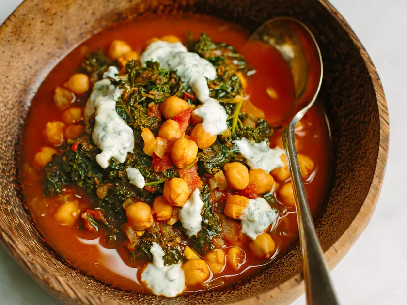 Chickpea, tomato and kale stew with herbed yoghurt