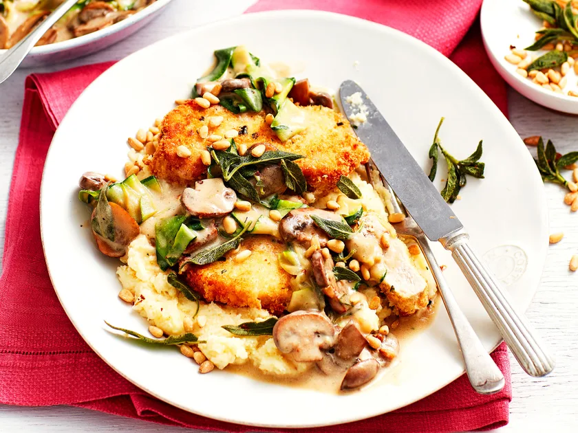 Herby pork schnitzel with mushroom, sage and wine sauce