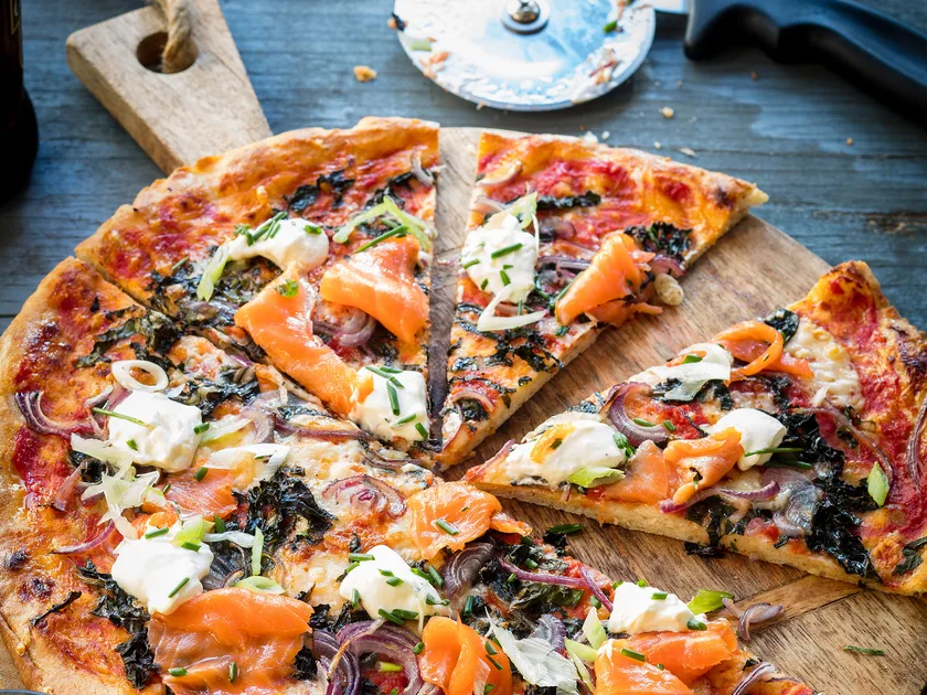 Smoked salmon, caper and red onion pizza with rocket