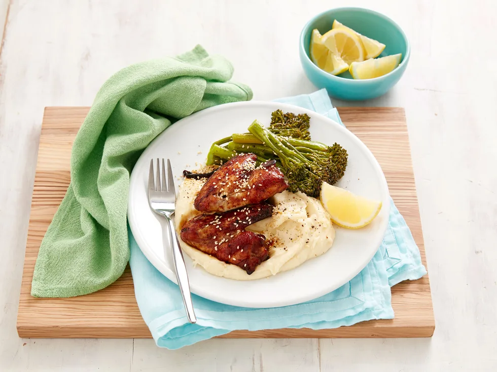 Roasted garlic and sesame broccolini with chicken wings
