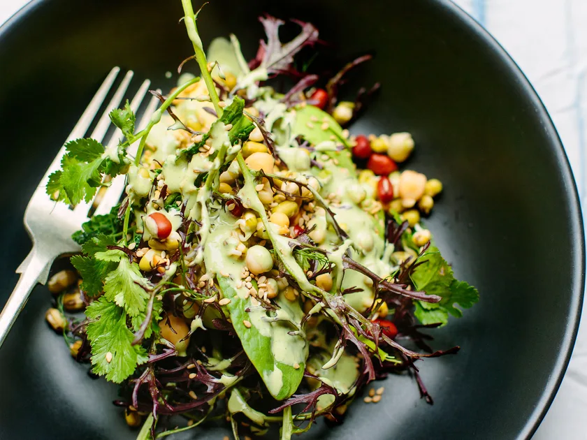 Avocado and sprout salad with green tahini dressing