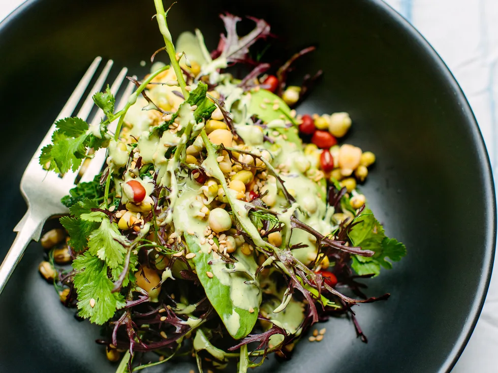 Avocado and sprout salad with green tahini dressing
