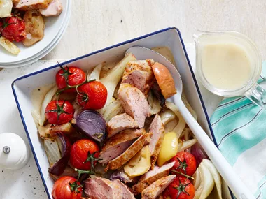 Roast pork with apples and red onion
