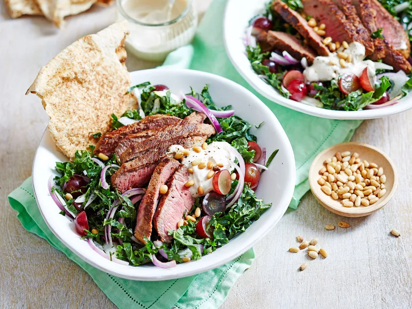 Grilled harissa lamb loin with kale salad