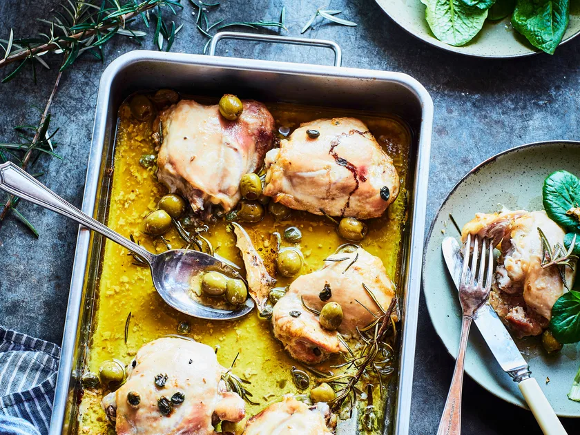 Baked chicken thighs with green olives and lemon