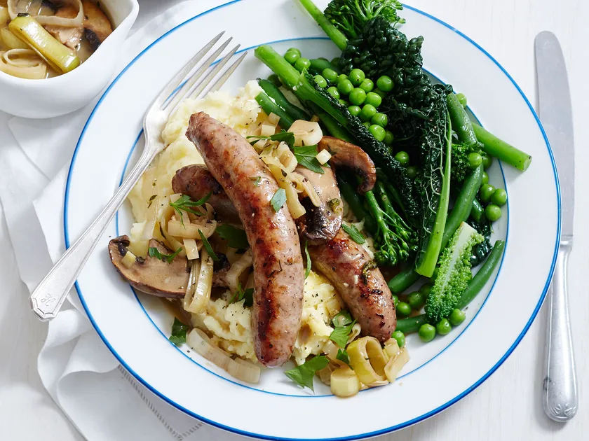 Bangers and mash with leek and mushrooms