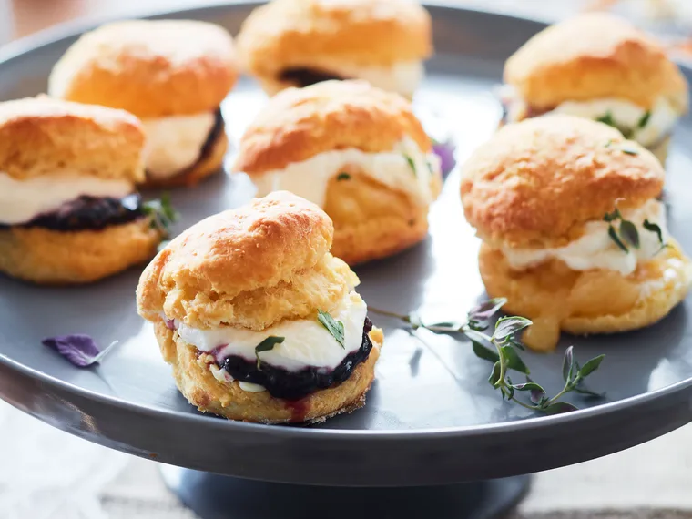 Thyme and fennel scones with blackberry jam and lemon curd