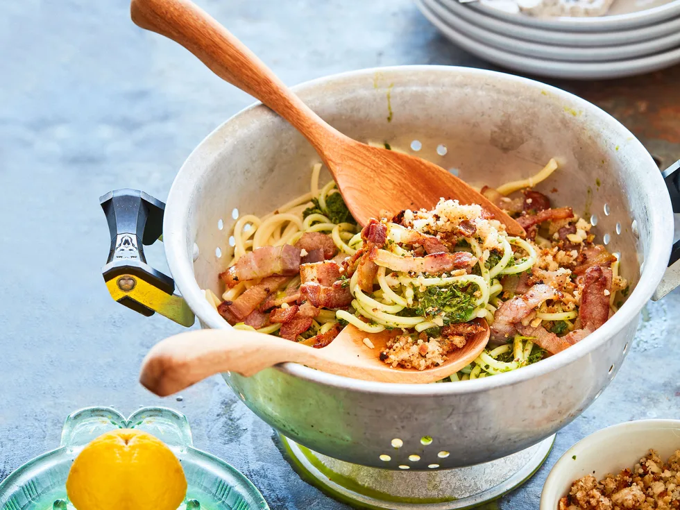 Bacon and kale spaghetti with macadamia and lemon crumbs