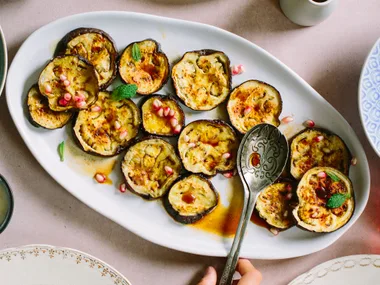 Roasted eggplant slices with pomegranate dressing