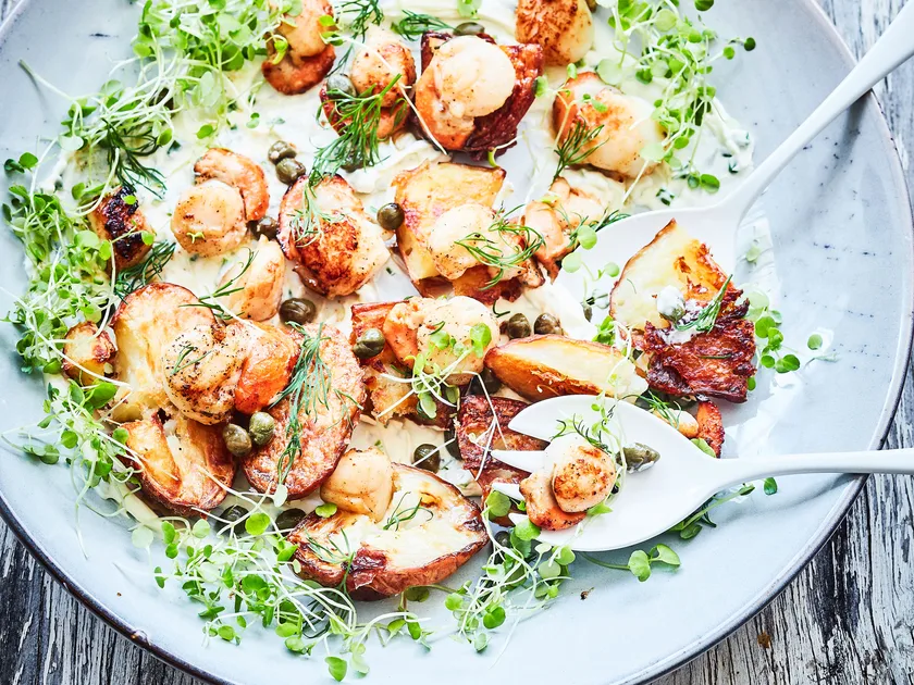 Pan-seared scallops with roasted potatoes and lemon