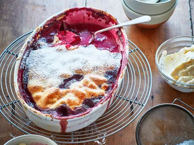 Berry and apple pie with clotted cream