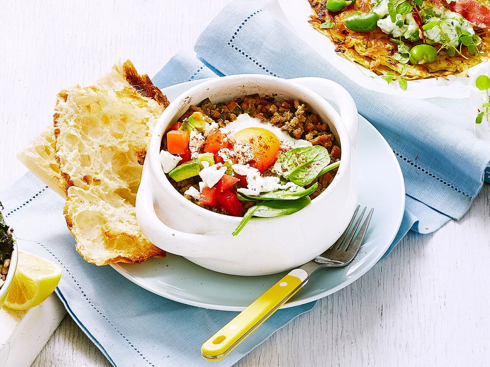 Turkish breakfast clay pots with spiced mince and eggs