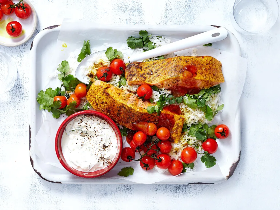 Garam masala grilled salmon with raita and tomatoes