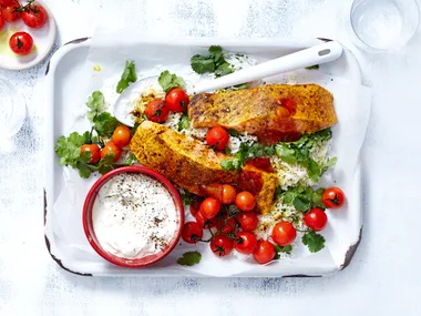 Garam masala grilled salmon with raita and tomatoes