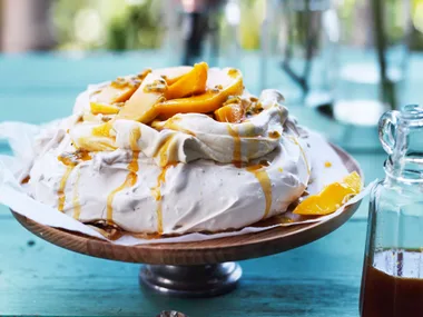 Coconut pavlova with mango and passionfruit caramel