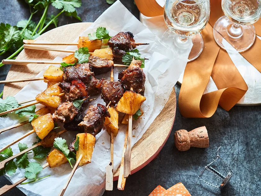 Sticky sweet and sour pork and pineapple skewers