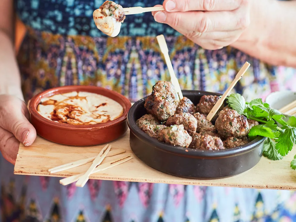 Lamb and coriander feta-stuffed meatballs with yoghurt sauce