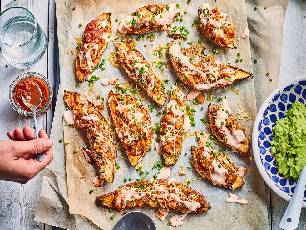 Stuffed baby kumara with cheese, spices and herbs
