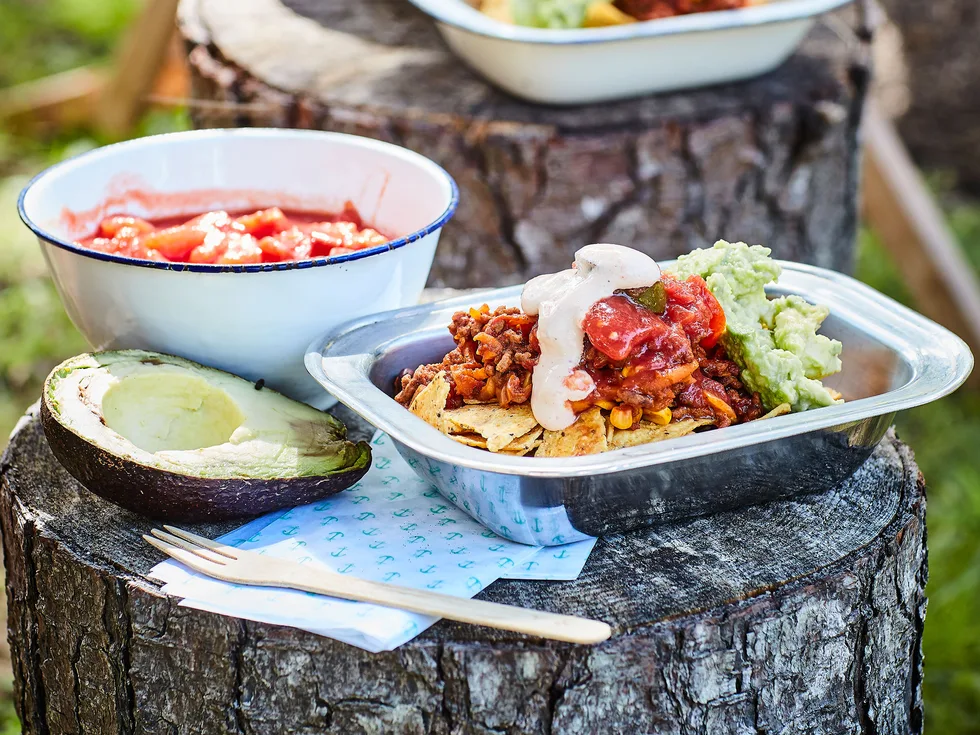 Make-ahead beef nachos with guacamole and chipotle sour cream