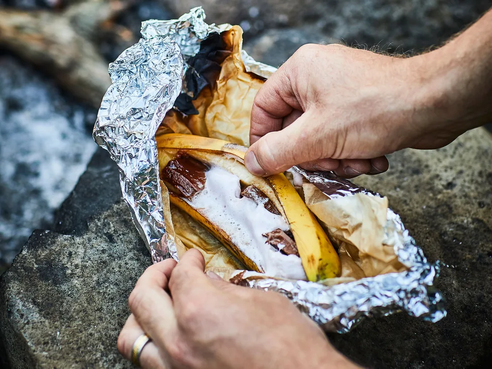 Gooey campfire baked chocolate and marshmallow bananas