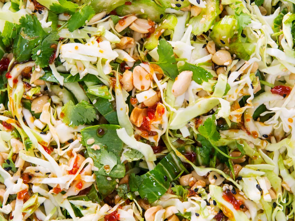 Crunchy Asian cabbage and peanut slaw with ponzu dressing