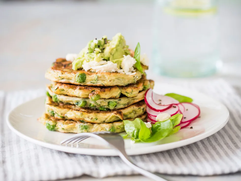 Avocado, courgette and pea fritters with feta and mint