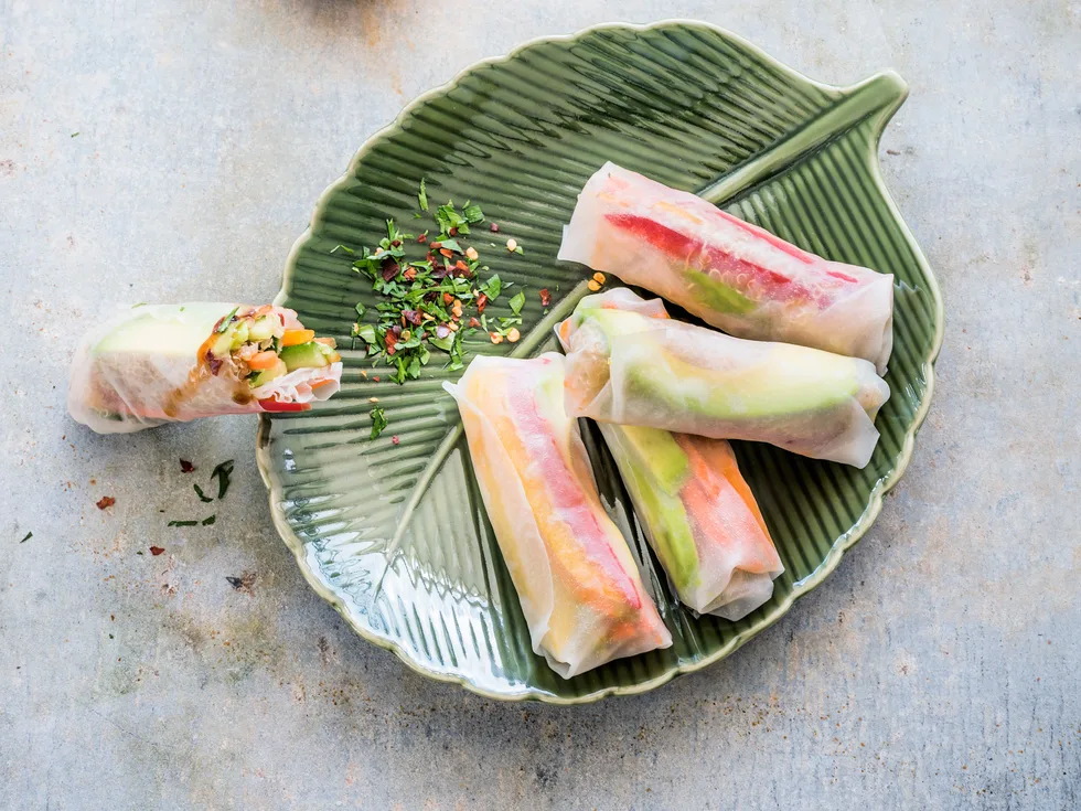 Avocado and quinoa rice paper rolls with herb and chilli mix