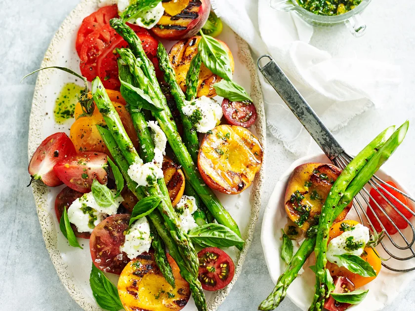Peach and asparagus caprese salad with pistachio mint pesto