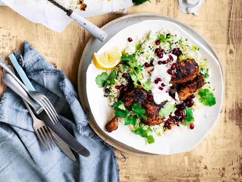 Moroccan spiced chicken with yoghurt sauce and green rice