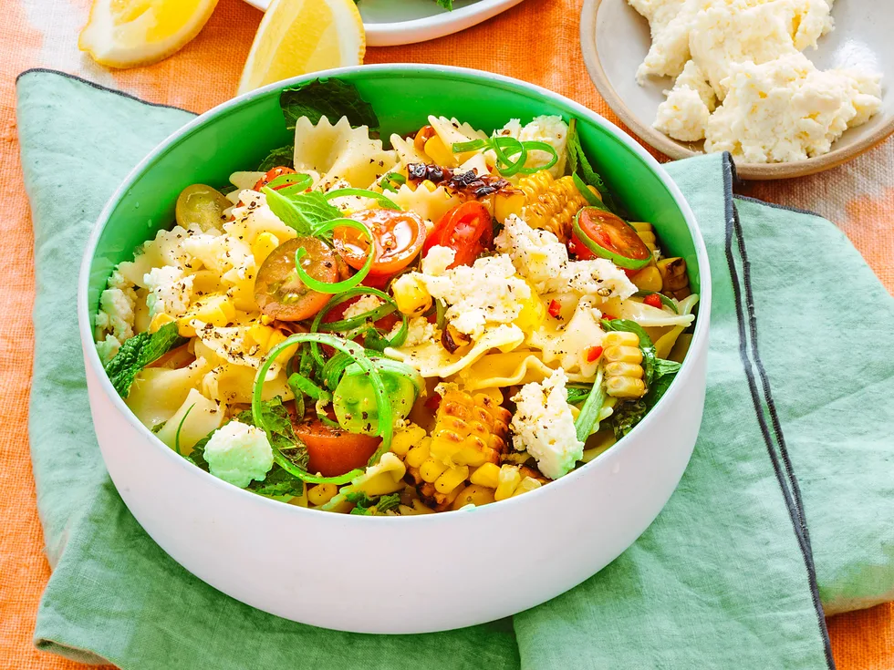 Corn and tomato pasta salad with lemon and ricotta