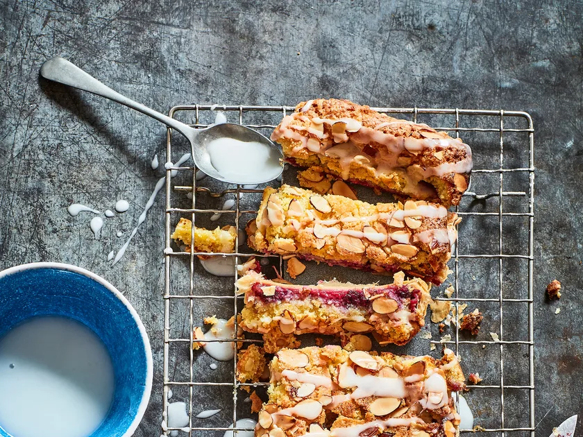 Crushed raspberry Bakewell tart with lemon drizzle icing