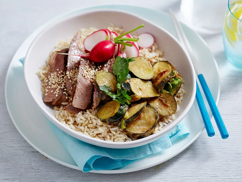 Miso-marinated beef and courgette brown rice bowls