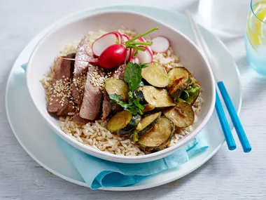 Miso-marinated beef and courgette brown rice bowl