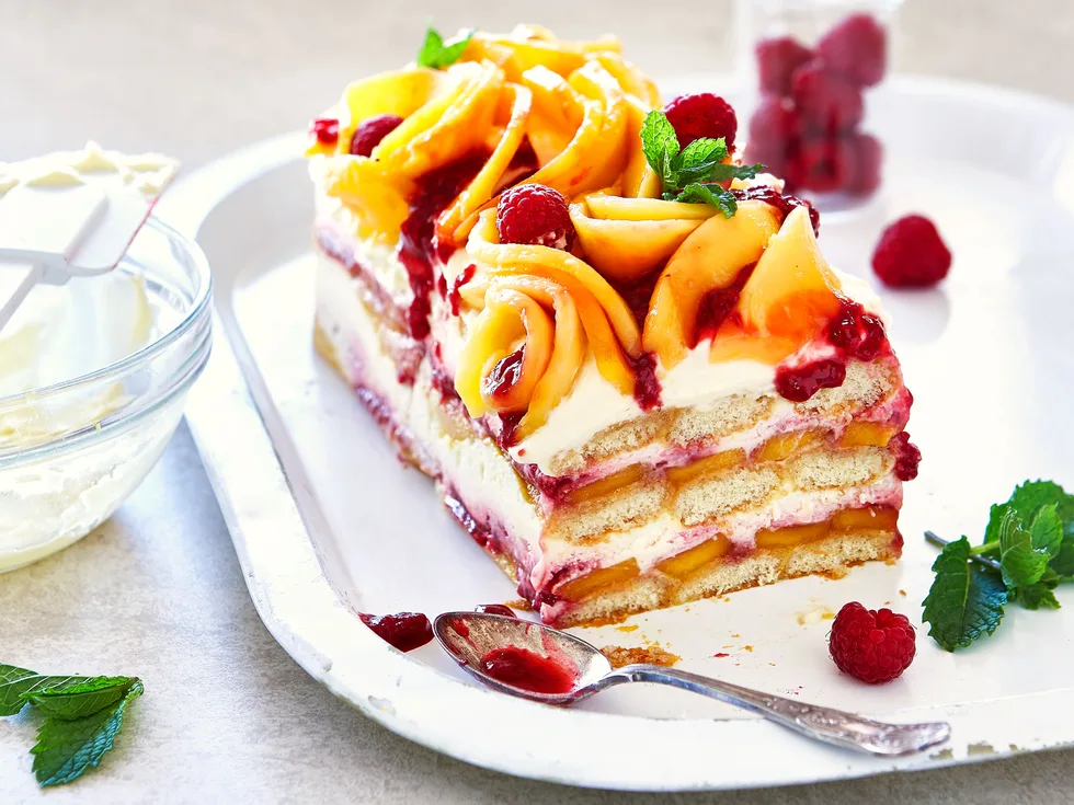 Boozy mango and orange tiramisu with raspberry sauce