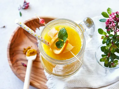 Mango, turmeric and orange vegan smoothie