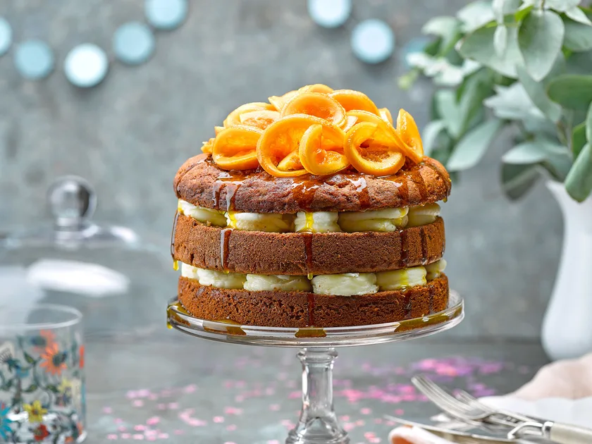 Spiced kūmara cake with orange syrup and frosting