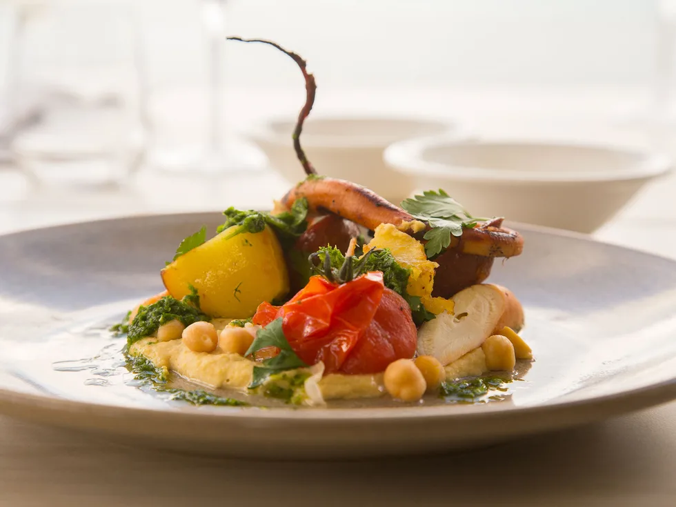Bazaar Restaurant’s confit octopus with hummus, spiced chorizo, tomato and parsley