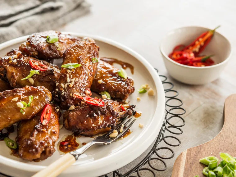 Sticky satay chicken nibbles