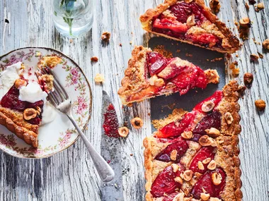Plum, honey and hazelnut frangipane tart