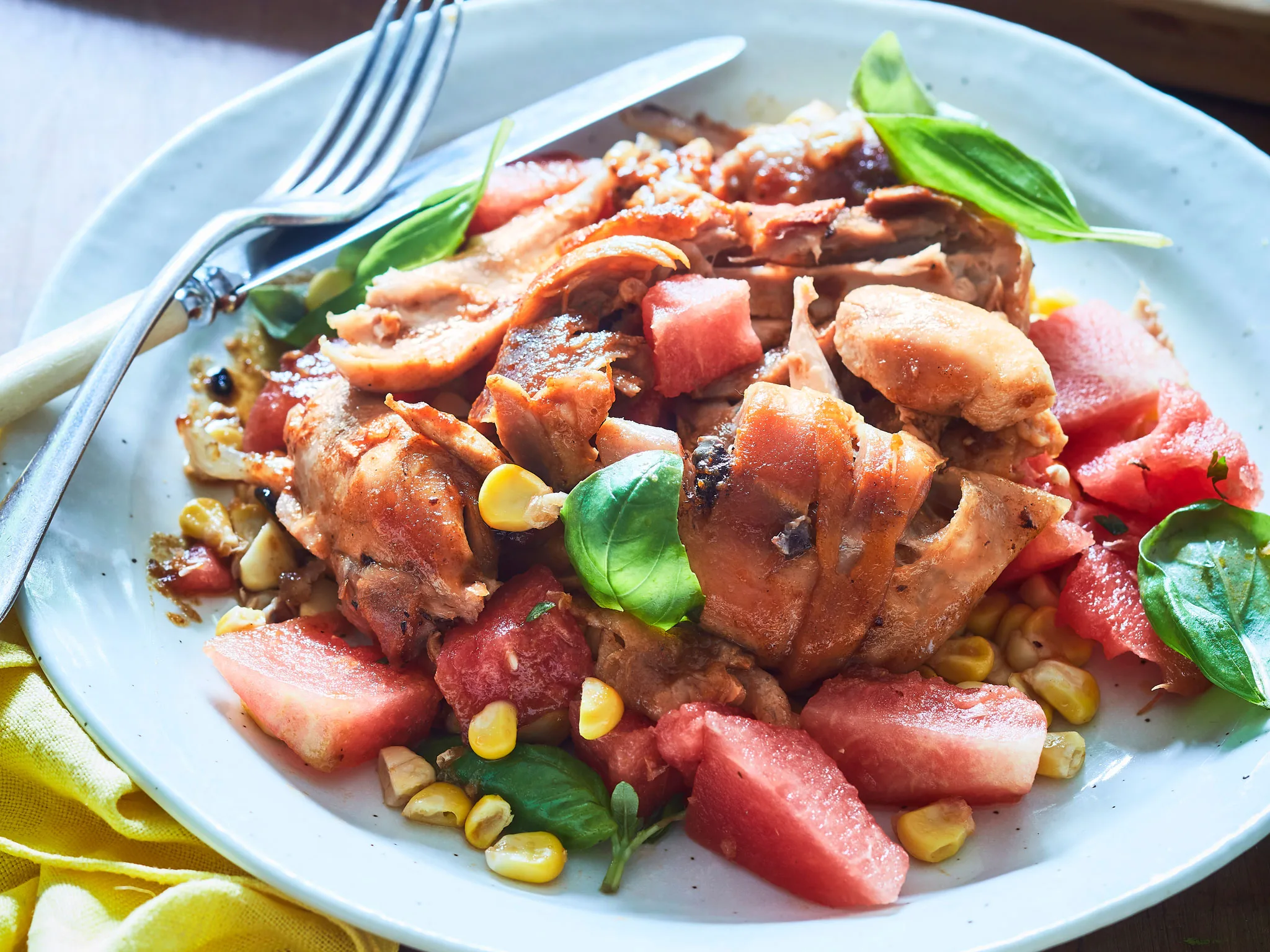 Roast chicken drumsticks with watermelon and corn salad