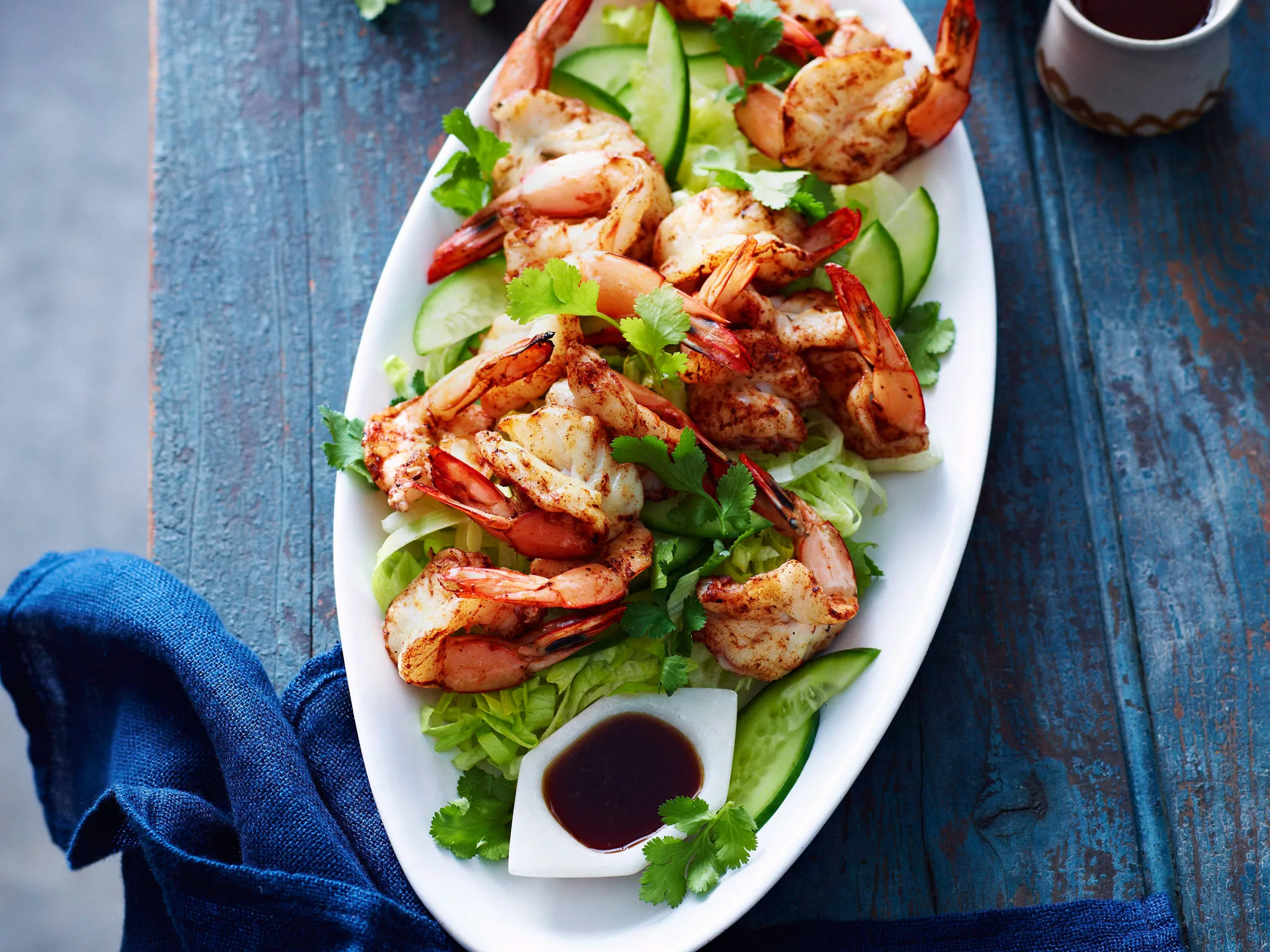 Five-spice prawn cutlets with lemon soy dressing