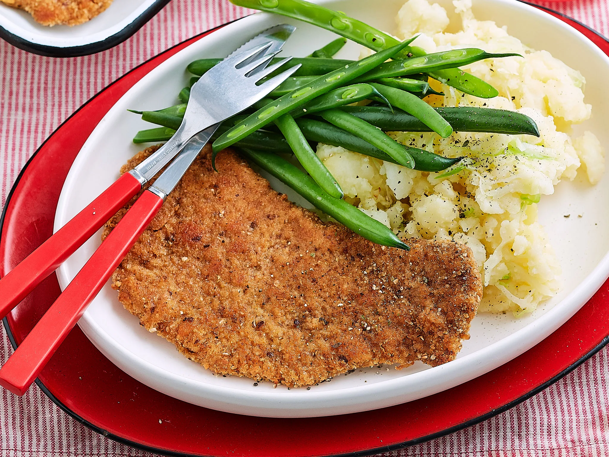 Veal schnitzel with potato and cabbage smash