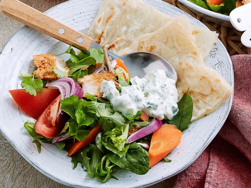 Tandoori chicken salad with cucumber yoghurt dressing