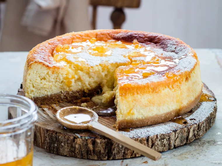 Baked lemon and ricotta cheesecake with marmalade syrup