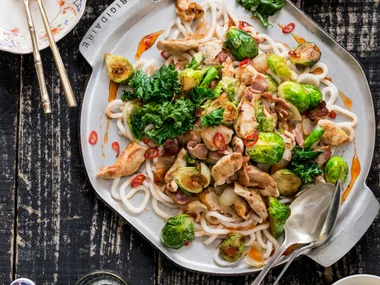 Chicken, bacon and Brussels sprout stir-fry with udon noodles