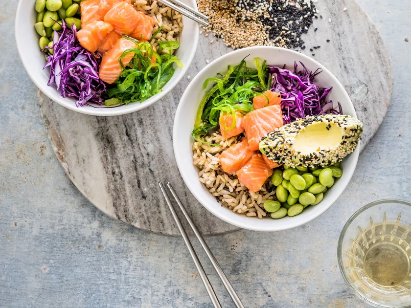 Ginger salmon poke-style bowl with spicy sesame avocado