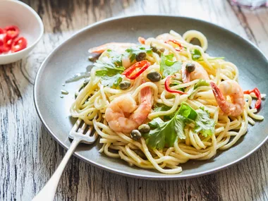Prawn pasta with garlic, chilli and capers