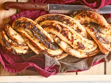 Confit onion and cheese bread twist