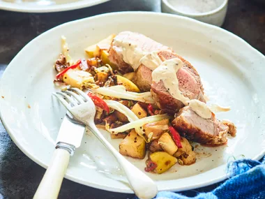 Pork medallions with apple, parsnips and mustard sauce